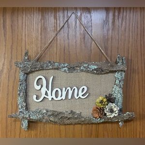 Hand crafted “Home” sign.